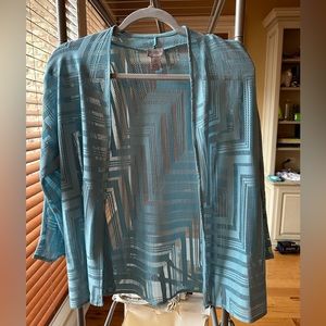 Chico’s Blue shrug cardigan with open weaving size 8 (0)